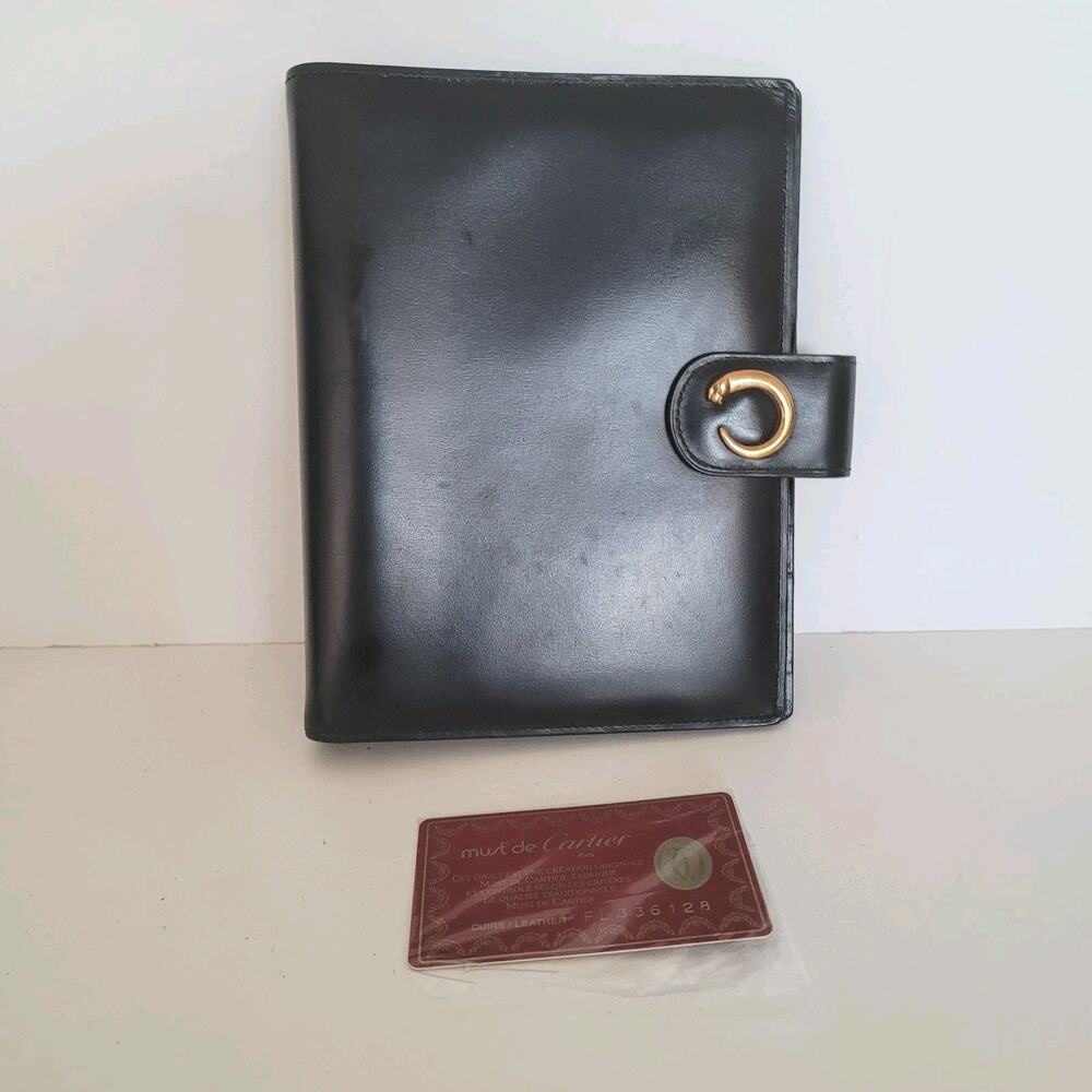 Cartier Black Leather Planner with Gold Panther Accent